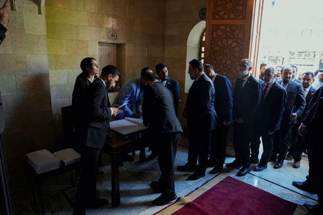 Damascus Syria Parliament First Session Members of Syria s People s Assembly check documents before the first session of the country s new parliament in Damascus, Syria, on July 12, 2026. The 210-member assembly is Syria s first parliament since the fall of the Assad government in December 2024 and is tasked with legislating during the transitional period. Damascus Damascus Syria Copyright: xOmarxAlbamx