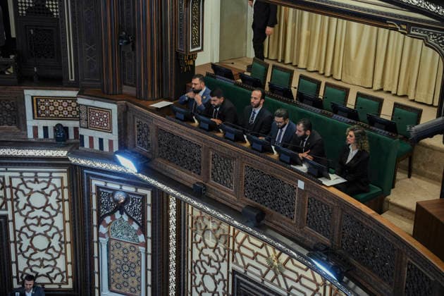 Damascus Syria Parliament First Session Members of Syria s People s Assembly take their seats in the parliamentary chamber during the first session of the country s new parliament in Damascus, Syria, on July 12, 2026. The 210-member assembly is Syria s first parliament since the fall of the Assad government in December 2024 and is tasked with legislating during the transitional period. Damascus Damascus Syria Copyright: xOmarxAlbamx