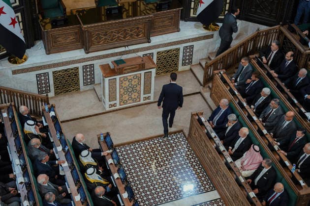 Damascus Syria Parliament First Session Syria s President Ahmed al-Sharaa walks through the chamber before addressing members of Syria s People s Assembly during the first session of the country s new parliament in Damascus, Syria, on July 12, 2026. The assembly s 30-month transitional term includes reviewing legislation, overseeing government work and approving the state budget and international treaties. Damascus Damascus Syria Copyright: xOmarxAlbamx