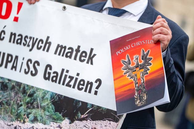 Warszawa 12.07.2026 Polish nationalist Volhynia March in memory of massacres of Poles in Volhynia organized by the far right --- Marsz Wolynski upamietniajacy ofiary Rzezi Wolynskiej organizowany przez prawicowych politykow. Persons shown : marsz uczestnicy ksiazka polski chrystus Fot. Kai Taller Arena Akcji NEWSPIX.PL --- newspix.pl POLAND OUT! 