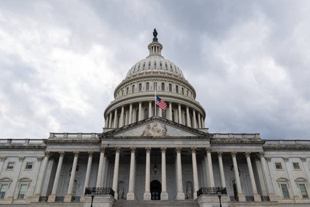 July 12, 2026, Washington, District Of Columbia, United States: U.S. flags fly at half-staff atop the U.S. Capitol following the death of Senator LINDSEY GRAHAM. Washington United States - ZUMAk206 20260712_znp_k206_003 Copyright: xMattxKaminskyx