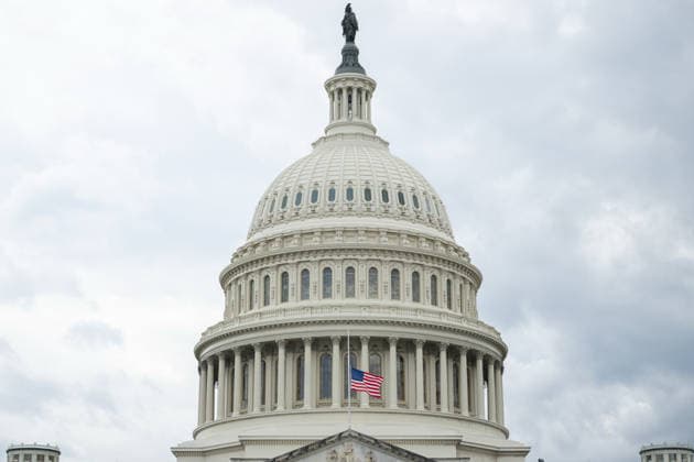 July 12, 2026, Washington, District Of Columbia, United States: U.S. flags fly at half-staff atop the U.S. Capitol following the death of Senator LINDSEY GRAHAM. Washington United States - ZUMAk206 20260712_znp_k206_012 Copyright: xMattxKaminskyx