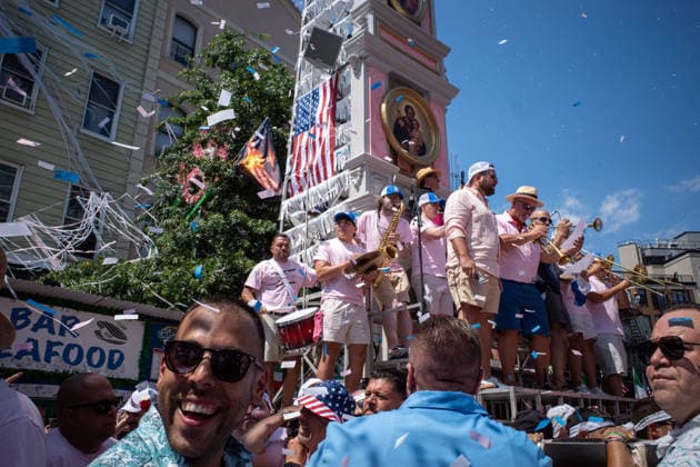 July 12, 2026, New York, New York, USA: A band plays on one of the levels of the Giglio float as they are lifted...The Ã¢â‚¬oeDancing of the GiglioÃ¢â‚¬Â is an annual event, held in Williamsburg, Brooklyn in front of Our Lady of Mount Carmel. The Italian community takes part in a 139 year old tradiontion celebration heritage, faith and culture. New York USA - ZUMAp288 20260712_znp_p288_014 Copyright: xSyndixPilarx