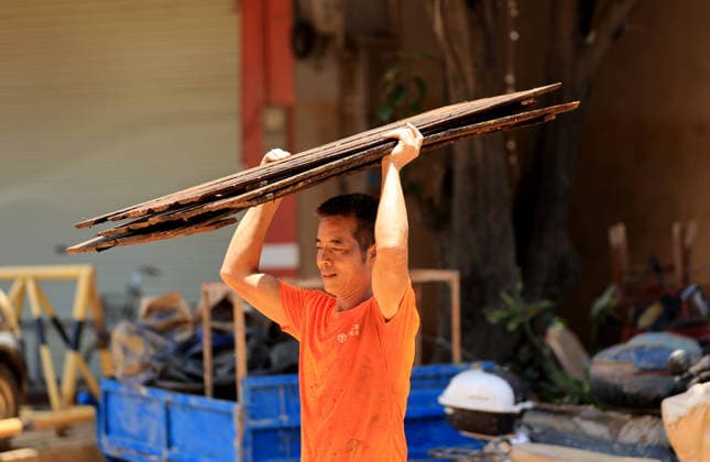 GUIGANG, CHINA - JULY 12: A villager clean furniture soaked by floodwaters on July 12, 2026 in Guigang, Guangxi Zhuang Autonomous Region of China. Floodwaters have receded and residents lives have returned to normal.  Copyright: xVCGx 111653899640