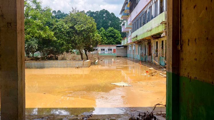 GUIGANG, CHINA - JULY 12: Shops and houses along the street are submerged by floodwaters on July 12, 2026 in Guigang, Guangxi Zhuang Autonomous Region of China. Floodwaters have receded, and mud remains on the road surfaces.  Copyright: xVCGx 111653899653