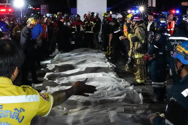 Bangkok Pub Fire Kills At Least 27 People Members of emergency personnel work next to covered bodies at the site of a fire at a pub in Bangkok, Thailand, on July 13, 2026. A large fire engulfs a pub in Bangkok early on Monday morning local time, resulting in at least 27 fatalities before firefighters bring the blaze under control, according to officials. Bangkok Bangkok Thailand  Copyright: xAnusakxLaowilasx originalFilename: laowilas-notitle260713_npDCJ.jpg