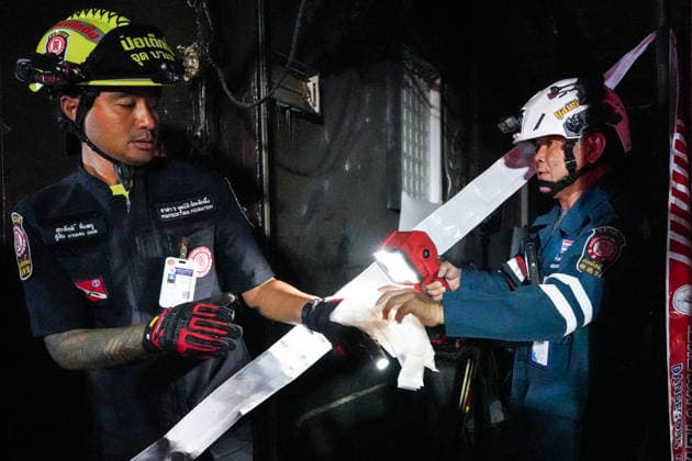 Bangkok Pub Fire Kills At Least 27 People Members of emergency personnel work at the site of a deadly fire at a pub in Bangkok, Thailand, on July 13, 2026. A large fire engulfs a pub in Bangkok early on Monday morning local time, resulting in the deaths of at least 27 people before firefighters bring the blaze under control, according to officials. Bangkok Bangkok Thailand  Copyright: xAnusakxLaowilasx originalFilename: laowilas-notitle260713_npS5t.jpg