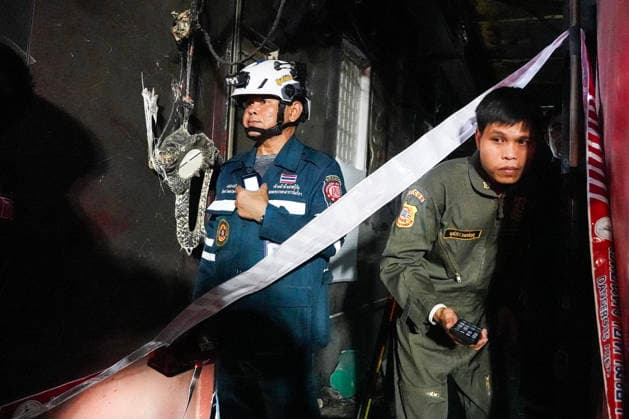 Bangkok Pub Fire Kills At Least 27 People Members of emergency personnel work at the site of a deadly fire at a pub in Bangkok, Thailand, on July 13, 2026. A large fire engulfs a pub in Bangkok early on Monday morning local time, resulting in the deaths of at least 27 people before firefighters bring the blaze under control, according to officials. Bangkok Bangkok Thailand  Copyright: xAnusakxLaowilasx originalFilename: laowilas-notitle260713_np59Q.jpg