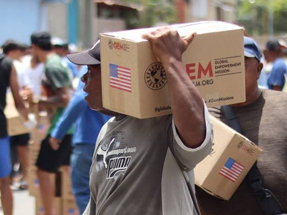Aid organization distributes relief supplies in La Guaira LA GUAIRA, VENEZUELA JULY 13, 2026: Volunteers from Global Empowerment Mission (GEM) distribute non-perishable food, bottled water and essential relief supplies to residents of Naiguata parish in La Guaira state, Venezuela, following the recent earthquake that affected the region. Humanitarian assistance continues as communities recover from the disaster. La Guaira Venezuela (Bolivarian Republic of) Copyright: x xmarioxfloresx xJNAxPressx