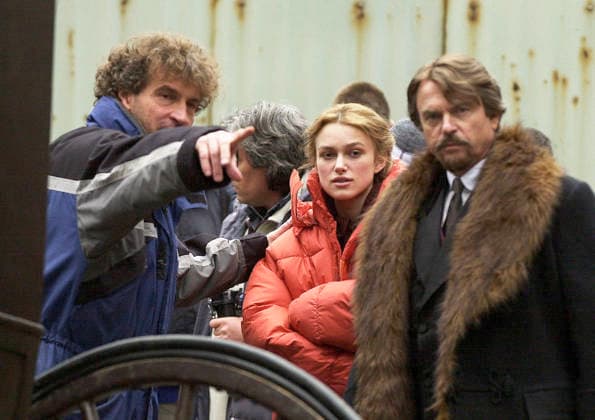 ***FILE PHOTO*** Actor Sam Neill (right) and actress Kiera Knightley (center) are talking with members of the film crew, which began shooting an adaptation of Pasternak s novel Doctor Zhivago on March 20, 2002, in the historic district of Olomouc, Czech Republic. (CTKxPhoto VladislavxGalgonek) CTKPhotoFO00382990  CTKPhotoFO00382990