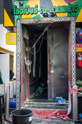 July 13, 2026, Bangkok, Thailand: A close view of the entrance to the Rong Beer Na Lat Phrao pub after the fire on Lat Phrao Road in Bangkok. The aftermath of a deadly fire at the Rong Beer Na Lat Phrao pub in Bangkok on 13 July 2026. The blaze killed at least 27 people and injured dozens. Authorities are investigating the cause of the fire. Bangkok Thailand - ZUMAs197 20260713_aaa_s197_012 Copyright: xNathaliexJamoisx