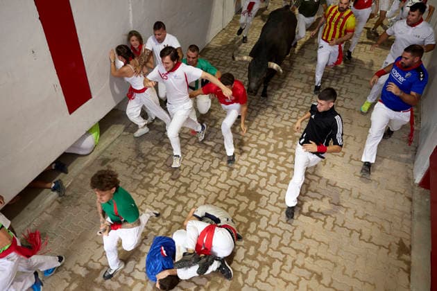 Running of the bulls in San Fermin, Spain - 13 Jul 2026 Runners run in front of the bulls through the streets of Pamplona during the running of the bulls during the San Fermín 2026 festivities, the bulls are from the Miura ranch. Pamplona Spain Copyright: xFernandoxPidalx xSOPAxImagesx encierro67733