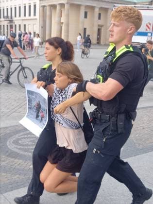 Greta Thunberg detained during Peacefully Against Genocide protest in Berlin BERLIN, GERMANY - JULY 13: (----EDITORIAL USE ONLY - MANDATORY CREDIT - PEACEFULLY AGAINST GENOCIDE HANDOUT - NO MARKETING NO ADVERTISING CAMPAIGNS - DISTRIBUTED AS A SERVICE TO CLIENTS----) Activist Greta Thunberg is detained during Peacefully Against Genocide protest against the production of weapons destined for Palestine and Lebanon as people gather in front of the offices of the arms manufacturer Rheinmetall near the Brandenburg Gate in Berlin, Germany on July 13, 2026. Peacefully Against Genocide Anadolu Berlin Germany. Editorial use only. Please get in touch for any other usage.  Copyright: x2026xAnadoluxPeacefullyxAgainstxGenocidex