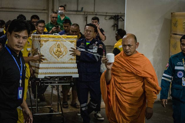 Relatives gather to claim bodies after Bangkok pub fire BANGKOK, THAILAND - JULY 13: Monks and family members bring the coffins as relatives of the victims of a deadly pub fire arrive at the Institute of Forensic Medicine at the Police Hospital to claim the bodies in Bangkok, Thailand on July 13, 2026. The blaze at The Rong Beer Na Lat Phrao pub resulted in at least 27 deaths and left 63 others injured, including 22 in critical condition, making it one of the deadliest incidents in the popular tourist destination. Wissarut Weerasopon Anadolu Bangkok Thailand. Editorial use only. Please get in touch for any other usage.  Copyright: x2026xAnadoluxWissarutxWeerasoponx