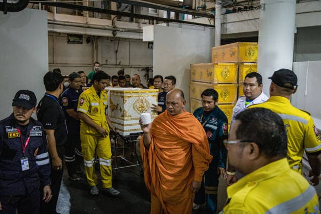 Relatives gather to claim bodies after Bangkok pub fire BANGKOK, THAILAND - JULY 13: Monks and family members bring the coffins as relatives of the victims of a deadly pub fire arrive at the Institute of Forensic Medicine at the Police Hospital to claim the bodies in Bangkok, Thailand on July 13, 2026. The blaze at The Rong Beer Na Lat Phrao pub resulted in at least 27 deaths and left 63 others injured, including 22 in critical condition, making it one of the deadliest incidents in the popular tourist destination. Wissarut Weerasopon Anadolu Bangkok Thailand. Editorial use only. Please get in touch for any other usage.  Copyright: x2026xAnadoluxWissarutxWeerasoponx