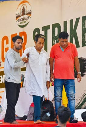 NEW DELHI, INDIA - JULY 13: Activist Sonam Wangchuk escorted by supporters to the washroom as he continues his indefinite hunger strike for the sixteenth consecutive day in solidarity with the protest by Cockroach Janta Party demanding the immediate resignation of Union Education Minister Dharmendra Pradhan following paper leak irregularities during the national NEET-UG 2026 medical entrance examinations, at Janatar Mantar on July 13, 2026 in New Delhi, India. (Photo by Vipin Kumar Hindustan Times) Activist Sonam Wangchuk Continues His Indefinite Hunger Strike At Jantar Mantar For 16th Day