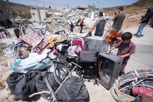 Israel demolishes Palestinian home in the West Bank SALFIT, WEST BANK, PALESTINE - JULY 13: A view of household belongings as Israeli forces demolish the home of Palestinian Hasan al-Rinawi with a bulldozer and heavy machinery alleging it was built without a permit in the village of Kufr al Dik, west of Salfit in the West Bank, Palestine, on July 13, 2026. Issam Rimawi Anadolu Salfit West Bank. Editorial use only. Please get in touch for any other usage.  Copyright: x2026xAnadoluxIssamxRimawix
