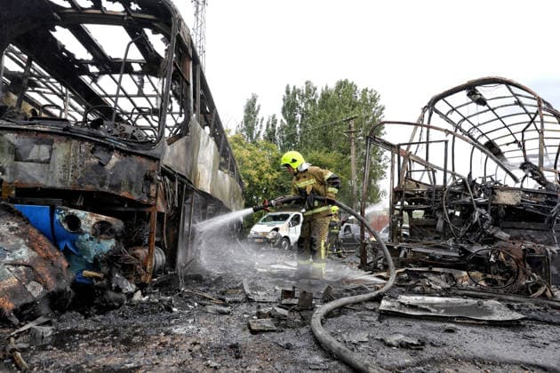 RECORD DATE NOT STATED Firefighters with the State Emergency Service of Ukraine extinguish smoldering hotspots at a bus depot destroyed in a Russian missile and drone attack in Odesa, Ukraine, on July 13, 2026. Russian forces launched a missile and drone attack on the city on the morning of July 13, damaging a transport company, private houses and a sanatorium building. Four people, including a five-year-old girl, were injured (Photo by Nina Liashonok Ukrinform) Russian attack damages bus depot in Odesa  Copyright: xNinaxLiashonokx