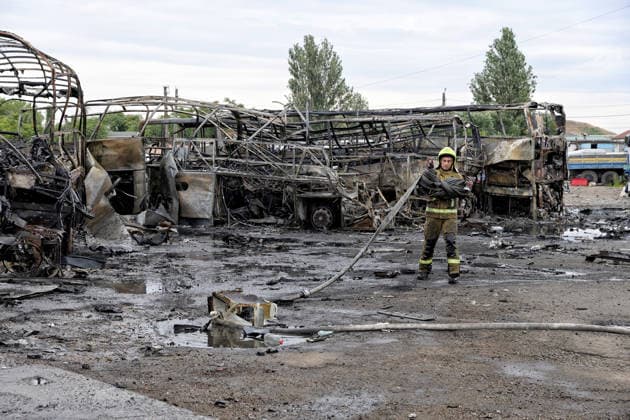 RECORD DATE NOT STATED Firefighters with the State Emergency Service of Ukraine extinguish smoldering hotspots at a bus depot destroyed in a Russian missile and drone attack in Odesa, Ukraine, on July 13, 2026. Russian forces launched a missile and drone attack on the city on the morning of July 13, damaging a transport company, private houses and a sanatorium building. Four people, including a five-year-old girl, were injured (Photo by Nina Liashonok Ukrinform) Russian attack damages bus depot in Odesa  Copyright: xNinaxLiashonokx