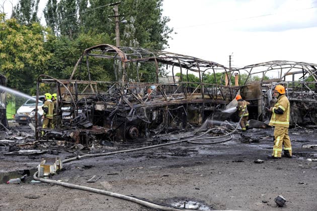 RECORD DATE NOT STATED Firefighters with the State Emergency Service of Ukraine extinguish smoldering hotspots at a bus depot destroyed in a Russian missile and drone attack in Odesa, Ukraine, on July 13, 2026. Russian forces launched a missile and drone attack on the city on the morning of July 13, damaging a transport company, private houses and a sanatorium building. Four people, including a five-year-old girl, were injured (Photo by Nina Liashonok Ukrinform) Russian attack damages bus depot in Odesa  Copyright: xNinaxLiashonokx
