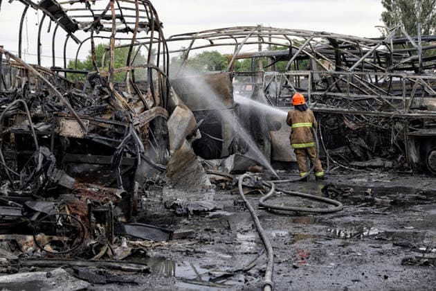 RECORD DATE NOT STATED Firefighters with the State Emergency Service of Ukraine extinguish smoldering hotspots at a bus depot destroyed in a Russian missile and drone attack in Odesa, Ukraine, on July 13, 2026. Russian forces launched a missile and drone attack on the city on the morning of July 13, damaging a transport company, private houses and a sanatorium building. Four people, including a five-year-old girl, were injured (Photo by Nina Liashonok Ukrinform) Russian attack damages bus depot in Odesa  Copyright: xNinaxLiashonokx