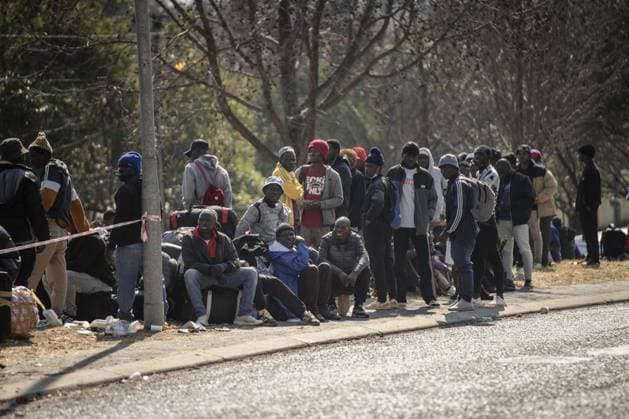 Malawians seek repatriation amid rising anti-immigrant tensions in South Africa JOHANNESBURG, SOUTH AFRICA - JULY 13: Malawian nationals wait outside the Malawian Consulate to seek repatriation amid growing fears following a surge in anti-immigrant protests and attacks in Johannesburg, South Africa, on July 13, 2026. Ihsaan Haffejee Anadolu Johannesburg Gauteng. Editorial use only. Please get in touch for any other usage.  Copyright: x2026xAnadoluxIhsaanxHaffejeex