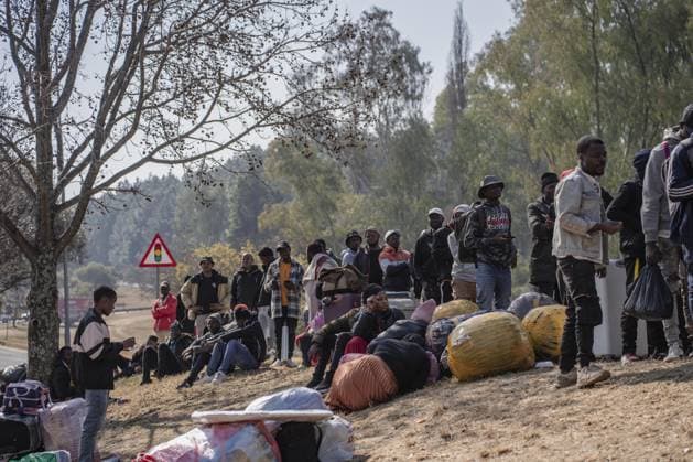 Malawians seek repatriation amid rising anti-immigrant tensions in South Africa JOHANNESBURG, SOUTH AFRICA - JULY 13: Malawian nationals wait outside the Malawian Consulate to seek repatriation amid growing fears following a surge in anti-immigrant protests and attacks in Johannesburg, South Africa, on July 13, 2026. Ihsaan Haffejee Anadolu Johannesburg Gauteng. Editorial use only. Please get in touch for any other usage.  Copyright: x2026xAnadoluxIhsaanxHaffejeex