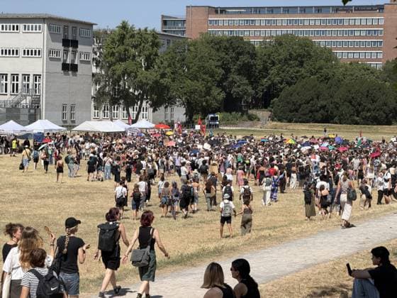 Protesters rally against German Chancellor Merz in Cologne COLOGNE, GERMANY - JULY 13: Demonstrators gather outside the University of Cologne during a protest while German Chancellor Friedrich Merz attends the official inauguration of the Adenauer School of Government in Cologne, Germany, on July 13, 2026. Around 4,000 people joined the demonstration, organized by the university s AStA together with student organizations, trade unions and political groups, criticizing the chancellor s domestic policies, migration policy, social reforms and Germany s support for Israel. Merz participated in the opening ceremony under heightened security while protesters marched and rallied near the university campus. Mesut Zeyrek Anadolu Cologne Germany. E  Copyright: x2026xAnadoluxMesutxZeyrekx