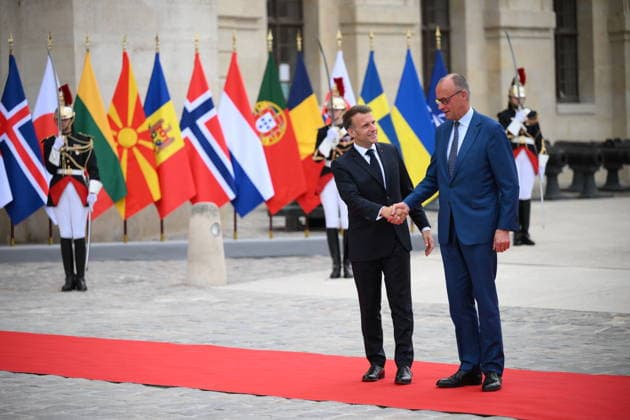 President Macron Welcomes European Leaders At The Coalition Of The Willing Summit - Paris French President Emmanuel Macron welcomes Chancellor of Germany, Friedrich Merz ahead the Coalition Of The Willing Summit in Paris, France on July 13, 2026. Photo by Eliot Blondet ABACAPRESS.COM Paris France  Copyright: xBlondetxEliot ABACAx