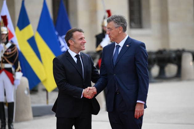 President Macron Welcomes European Leaders At The Coalition Of The Willing Summit - Paris French President Emmanuel Macron welcomes Croatian Prime Minister, Andrej Plenkovic ahead the Coalition Of The Willing Summit in Paris, France on July 13, 2026. Photo by Eliot Blondet ABACAPRESS.COM Paris France  Copyright: xBlondetxEliot ABACAx