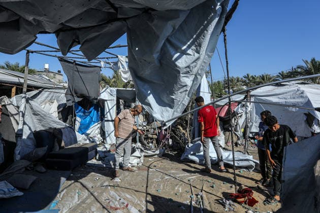 Israeli strikes target displaced Palestinians tents in Khan Yunis KHAN YUNIS, GAZA, PALESTINE - JULY 13: Israeli forces target tents sheltering displaced Palestinians amid continued attacks despite the ceasefire in Khan Yunis, Gaza, Palestine, on July 13, 2026. Abed Rahim Khatib Anadolu Khan Yunis Gaza. Editorial use only. Please get in touch for any other usage.  Copyright: x2026xAnadoluxAbedxRahimxKhatibx