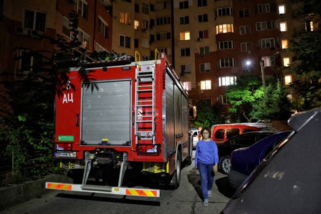 RECORD DATE NOT STATED Russian Drone Strike Damages Residential Building - Ukraine A woman walks past a fire engine at the scene of a Russian drone strike on a residential building in one of the districts of Odesa, Ukraine, on July 12, 2026 (Photo by Nina Liashonok Ukrinform ABACAPRESS.COM) Odesa Ukraine  Copyright: xLyashonokxNina Ukrinform ABACAx