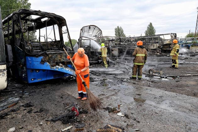 RECORD DATE NOT STATED Russian Attack Damages Bus Depot - Ukraine Firefighters with the State Emergency Service of Ukraine extinguish smoldering hotspots at a bus depot destroyed in a Russian missile and drone attack in Odesa, Ukraine, on July 13, 2026. Russian forces launched a missile and drone attack on the city on the morning of July 13, damaging a transport company, private houses and a sanatorium building. Four people, including a five-year-old girl, were injured (Photo by Nina Liashonok Ukrinform ABACAPRESS.COM) Odesa Ukraine  Copyright: xLyashonokxNina Ukrinform ABACAx