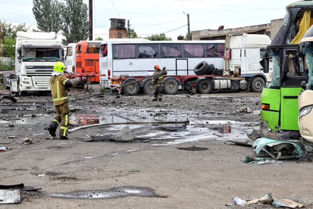 RECORD DATE NOT STATED Russian Attack Damages Bus Depot - Ukraine Firefighters with the State Emergency Service of Ukraine extinguish smoldering hotspots at a bus depot destroyed in a Russian missile and drone attack in Odesa, Ukraine, on July 13, 2026. Russian forces launched a missile and drone attack on the city on the morning of July 13, damaging a transport company, private houses and a sanatorium building. Four people, including a five-year-old girl, were injured (Photo by Nina Liashonok Ukrinform ABACAPRESS.COM) Odesa Ukraine  Copyright: xLyashonokxNina Ukrinform ABACAx