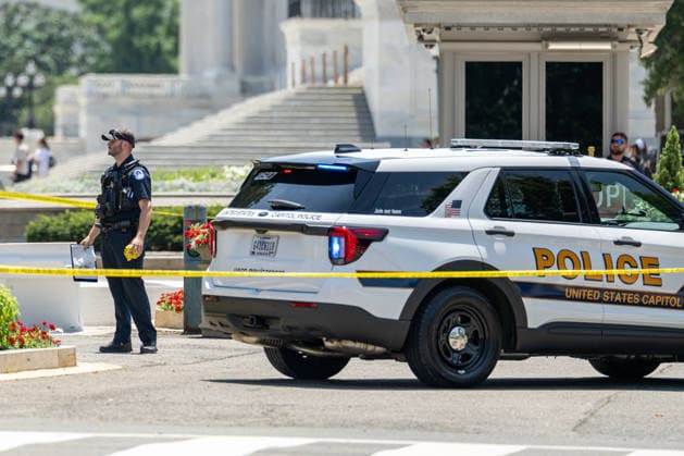 July 13, 2026, Washington, Disitrict Of Columbia, United States: A man is arrested by U.S. Capitol Police after allegedly bringing a firearm onto U.S. Capitol Grounds near the North Barricade in Washington, D.C. Officers quickly took the individual into custody without incident. Firearms are prohibited on Capitol Grounds, and the incident remains under investigation Washington United States  - ZUMAk206 20260713_znp_k206_004 Copyright: xMattxKaminskyx