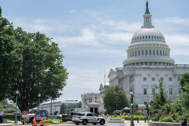 July 13, 2026, Washington, Disitrict Of Columbia, United States: A man is arrested by U.S. Capitol Police after allegedly bringing a firearm onto U.S. Capitol Grounds near the North Barricade in Washington, D.C. Officers quickly took the individual into custody without incident. Firearms are prohibited on Capitol Grounds, and the incident remains under investigation Washington United States - ZUMAk206 20260713_znp_k206_003 Copyright: xMattxKaminskyx