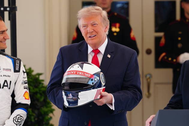 July 13, 2026, Washington, District Of Columbia, USA: United States President Donald J Trump holds a racing helmet as he hosts top IndyCar drivers at the White House in Washington, DC, USA, to promote the inaugural Freedom 250 Grand Prix on Monday, July 13, 2026. The race will be held in DC on August 22-23, 2026 Washington USA - ZUMAs152 20260713_faa_s152_013 Copyright: xAaronxSchwartzx-xPoolxviaxCNPx