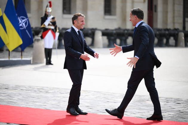 Emmanuel Macron, President of the French Republic, welcomes European leaders to the Coalition of the Willing Summit at the Hôtel des Invalides on July 13, 2026. Eliot Blondet, Pool, Abaca. French President Emmanuel Macron welcomes the 14th Secretary General of NATO, Mark Rutte ahead of the Coalition of the Willing Summit in Paris, France, on July 13, 2026. Photo by Eliot Blondet, ABACAPRESS.COM, Paris, France  Copyright: xEliotxBlondetx xPoolx xBestimagexEliotxBlondetx xPoolx xBestimagex