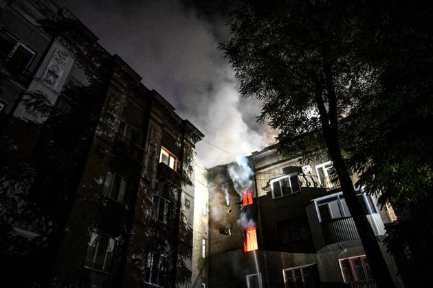 RECORD DATE NOT STATED Fire burns in a residential building damaged in a nighttime Russian drone attack in one of Zaporizhzhia s districts, Ukraine, on July 12, 2026. Six people, including a 15-year-old boy, were injured in the attack (Photo by Dmytro Smolienko Ukrinform) Nighttime Russian drone strike hits Zaporizhzhia  Copyright: xDmytroxSmolienkox