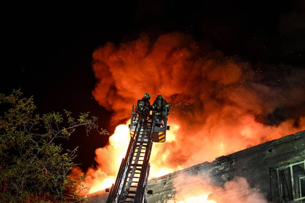 RECORD DATE NOT STATED Firefighters with the State Emergency Service of Ukraine extinguish a fire from an aerial ladder at a house following a nighttime Russian drone attack in Zaporizhzhia, Ukraine, on July 12, 2026. Six people, including a 15-year-old boy, were injured in the attack (Photo by Dmytro Smolienko Ukrinform) Nighttime Russian drone strike hits Zaporizhzhia  Copyright: xDmytroxSmolienkox