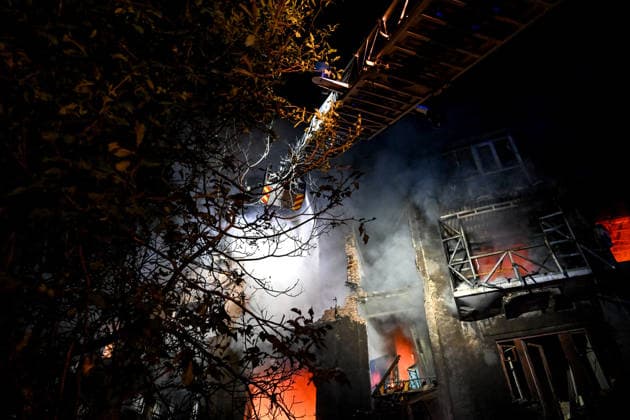 RECORD DATE NOT STATED A firefighter with the State Emergency Service of Ukraine extinguishes a fire from an aerial ladder at a residential building set ablaze by a nighttime Russian drone attack in Zaporizhzhia, Ukraine, on July 12, 2026. Six people, including a 15-year-old boy, were injured in the attack (Photo by Dmytro Smolienko Ukrinform) Nighttime Russian drone strike hits Zaporizhzhia  Copyright: xDmytroxSmolienkox