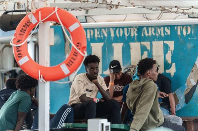 July 13, 2026, Ravenna, Italy: RAVENNA, ITALY - JULY 13, 2026 : The humanitarian vessel Open Arms, operated by the Spanish NGO of the same name, arrives at the port of Ravenna carrying 16 people rescued in the central Mediterranean, including seven unaccompanied minors. Disembarkation and initial reception procedures take place at the Fabbrica Vecchia quay in Marina di Ravenna, under the coordination of local authorities, medical personnel and organisations involved in migrant assistance. The arrival marks the first time the Open Arms has docked in the port of Ravenna. Ravenna Italy - ZUMAq101 20260713_zna_q101_186 Copyright: xSilviaxCasadeix