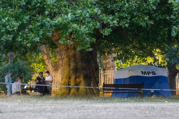 July 13, 2026, London, London, UK: London, UK. Emergency services at the scene in Hackney Downs, east London, following the fatal stabbing of a man in his late 20s. Police were called at around 1. 45pm to reports of a stabbing in a park near a school. Despite the efforts of paramedics, the victim died at the scene. London UK  - ZUMAl94_ 20260713_zaf_l94_013 Copyright: xMarcinxNowakx