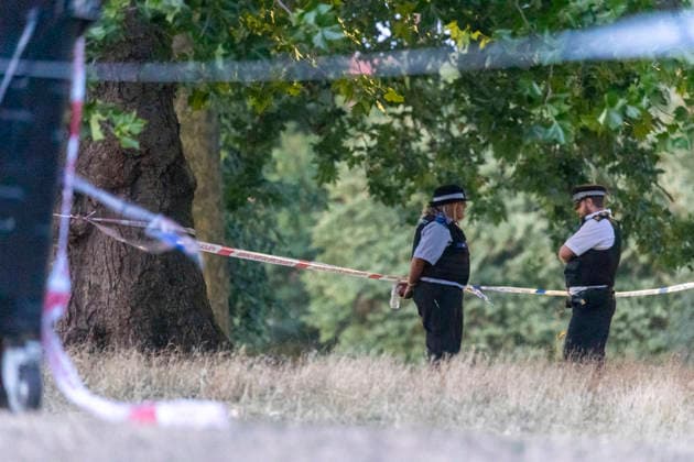 July 13, 2026, London, London, UK: London, UK. Emergency services at the scene in Hackney Downs, east London, following the fatal stabbing of a man in his late 20s. Police were called at around 1. 45pm to reports of a stabbing in a park near a school. Despite the efforts of paramedics, the victim died at the scene. London UK  - ZUMAl94_ 20260713_zaf_l94_015 Copyright: xMarcinxNowakx