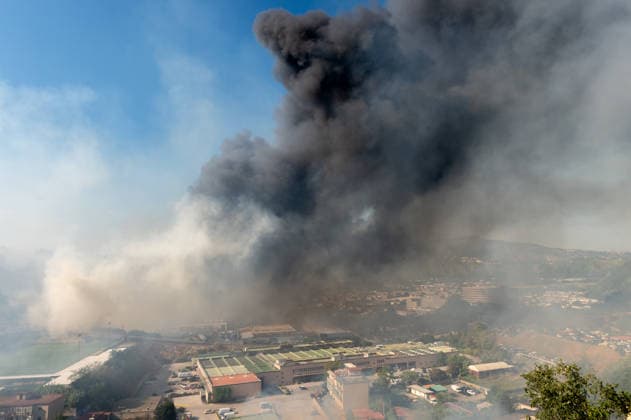 Wildfire erupts near Campi Flegrei volcanic area in Italy POZZUOLI, ITALY - JULY 13: A big wildfire is seen in the Pisciarelli area located on the outer edge of the Solfatara volcanic crater in the Campi Flegrei (Phlegraean Fields) volcanic region in Pozzuoli on July 13, 2026. The fire broke out in the undergrowth and quickly spread to several car dealerships, causing fuel tanks and tyres to explode. Eliano Imperato Anadolu Pozzuoli Italy. Editorial use only. Please get in touch for any other usage.  Copyright: x2026xAnadoluxElianoxImperatox