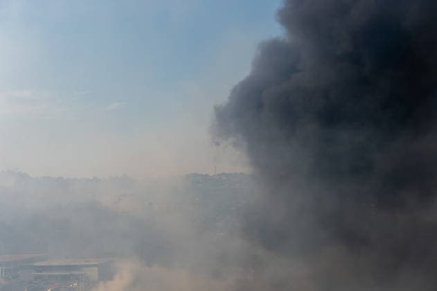 Wildfire erupts near Campi Flegrei volcanic area in Italy POZZUOLI, ITALY - JULY 13: A big wildfire is seen in the Pisciarelli area located on the outer edge of the Solfatara volcanic crater in the Campi Flegrei (Phlegraean Fields) volcanic region in Pozzuoli on July 13, 2026. The fire broke out in the undergrowth and quickly spread to several car dealerships, causing fuel tanks and tyres to explode. Eliano Imperato Anadolu Pozzuoli Italy. Editorial use only. Please get in touch for any other usage.  Copyright: x2026xAnadoluxElianoxImperatox