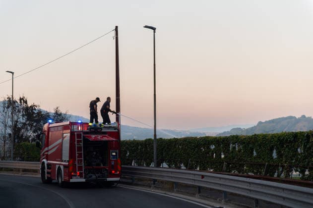 Wildfire erupts near Campi Flegrei volcanic area in Italy POZZUOLI, ITALY - JULY 13: Firefighters put out a big wildfire in the Pisciarelli area located on the outer edge of the Solfatara volcanic crater in the Campi Flegrei (Phlegraean Fields) volcanic region in Pozzuoli on July 13, 2026. The fire broke out in the undergrowth and quickly spread to several car dealerships, causing fuel tanks and tyres to explode. Eliano Imperato Anadolu Pozzuoli Italy. Editorial use only. Please get in touch for any other usage.  Copyright: x2026xAnadoluxElianoxImperatox