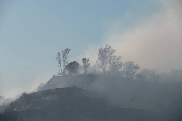 Wildfire erupts near Campi Flegrei volcanic area in Italy POZZUOLI, ITALY - JULY 13: A big wildfire is seen in the Pisciarelli area located on the outer edge of the Solfatara volcanic crater in the Campi Flegrei (Phlegraean Fields) volcanic region in Pozzuoli on July 13, 2026. The fire broke out in the undergrowth and quickly spread to several car dealerships, causing fuel tanks and tyres to explode. Eliano Imperato Anadolu Pozzuoli Italy. Editorial use only. Please get in touch for any other usage.  Copyright: x2026xAnadoluxElianoxImperatox