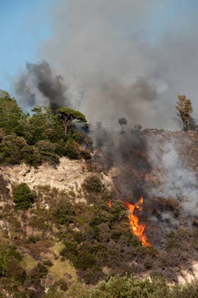 Wildfire erupts near Campi Flegrei volcanic area in Italy POZZUOLI, ITALY - JULY 13: A wildfire is seen in the Solfatara volcanic crater in the Campi Flegrei (Phlegraean Fields) volcanic region in Pozzuoli on July 13, 2026. The fire broke out in the undergrowth and quickly spread in the Pisciarelli area to several car dealerships, causing fuel tanks and tyres to explode. Eliano Imperato Anadolu Pozzuoli Italy. Editorial use only. Please get in touch for any other usage.  Copyright: x2026xAnadoluxElianoxImperatox