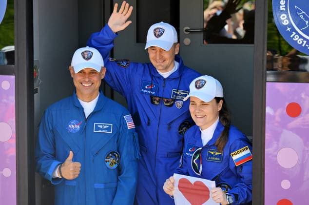 Kazakhstan Russia Space 9205135 14.07.2026 Prime crew members, NASA astronaut Anil Menon, Roscosmos cosmonauts Pyotr Dubrov and Anna Kikina leave their hotel for a pre-launch preparation ahead of the 75th expedition to the International Space Station (ISS) at the Baikonur Cosmodrome, in Baikonur, Kazakhstan. Yuri Kochetkov Sputnik Baikonur Kazakhstan  Copyright: xYurixKochetkovx